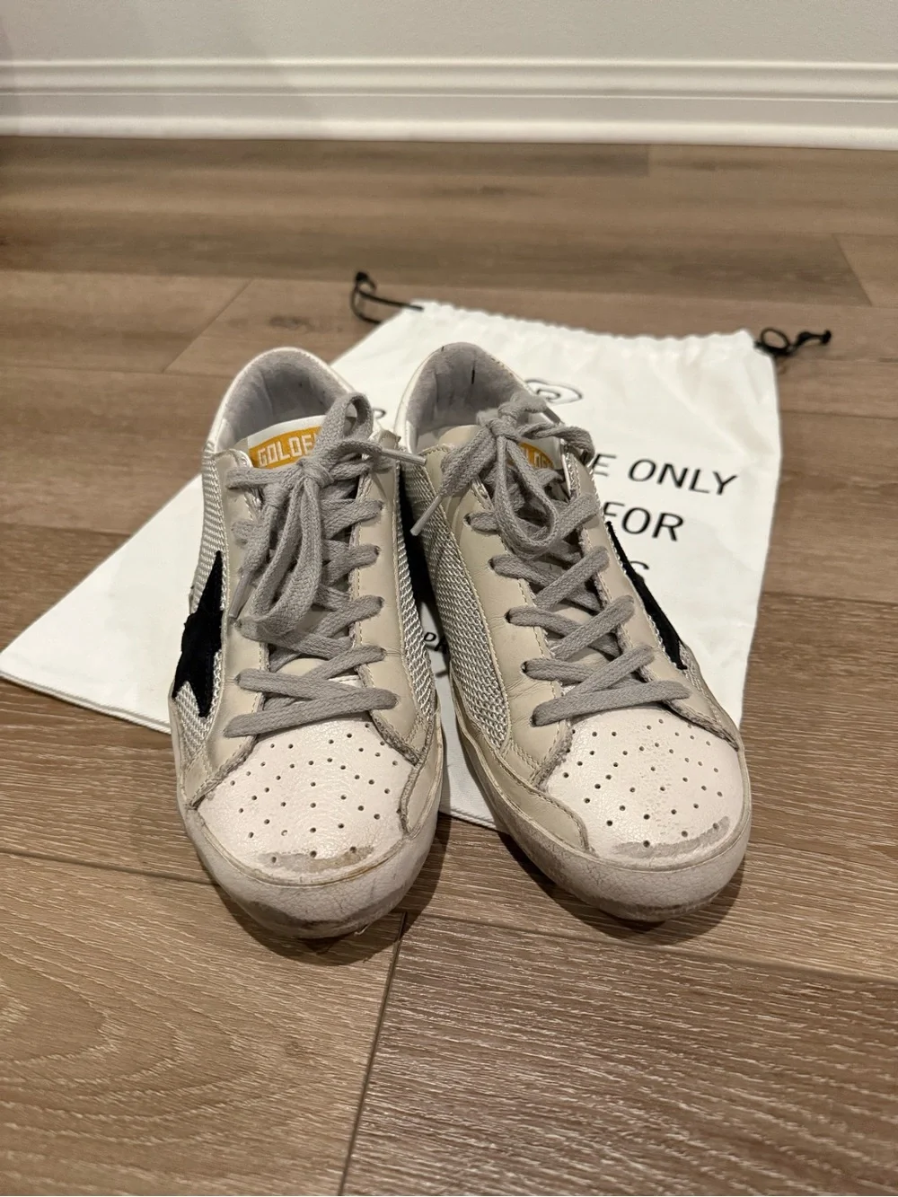 Golden Goose women’s White Sneakers with Black Star and Gray Laces